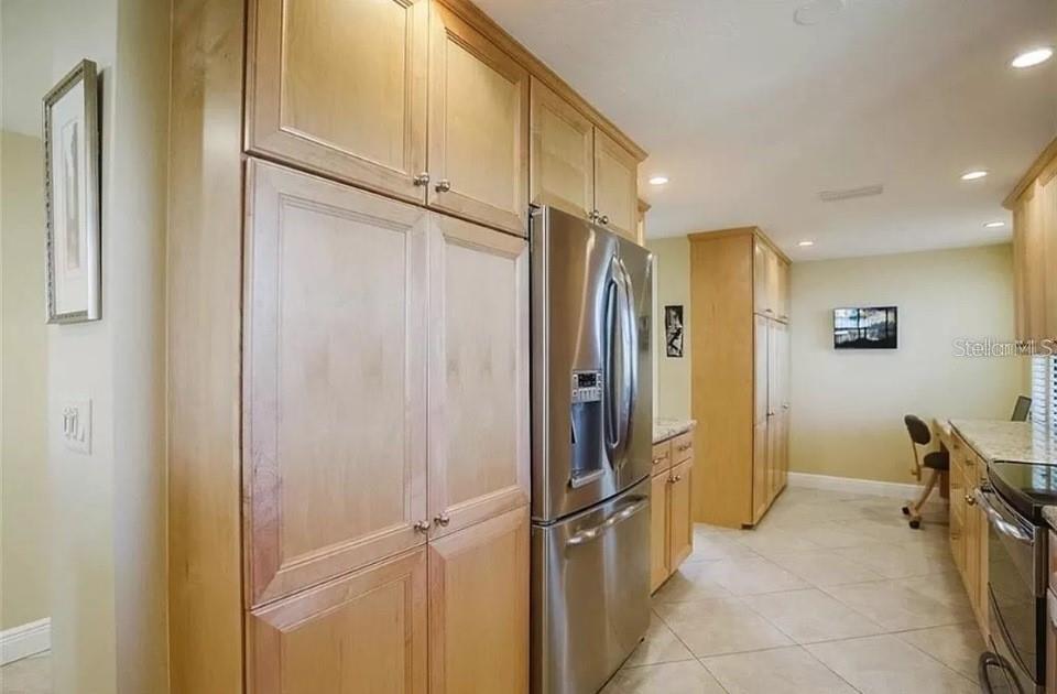 5911 Midnight Pass Road, Unit 601 Sarasota, FL 34242 - Photo 11 of 48 a bathroom with a glass shower door and a sink