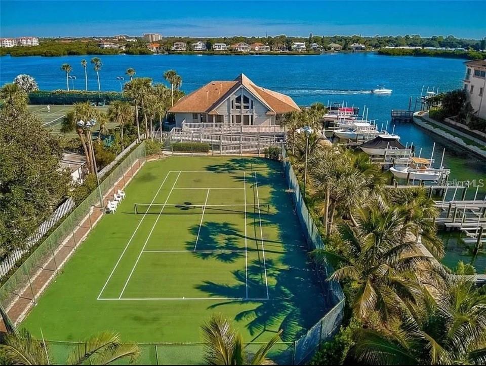 5911 Midnight Pass Road, Unit 601 Sarasota, FL 34242 - Photo 25 of 48 a view of a tennis court