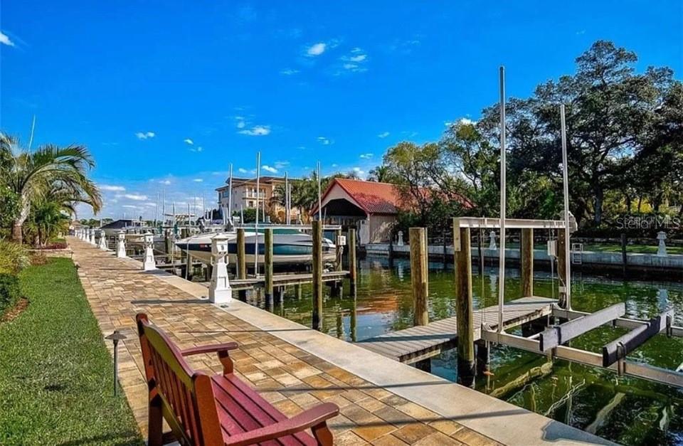 5911 Midnight Pass Road, Unit 601 Sarasota, FL 34242 - Photo 47 of 48 a view of a patio with swimming pool