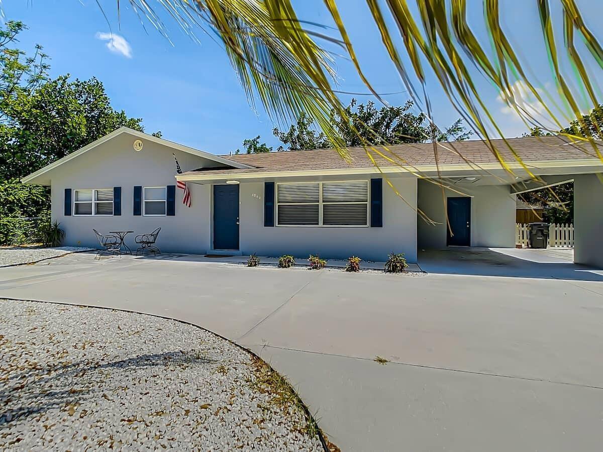 1944 Holman Drive, Unit B Juno Ridge, FL 33408 - Photo 1 of 12 Tiffany 3