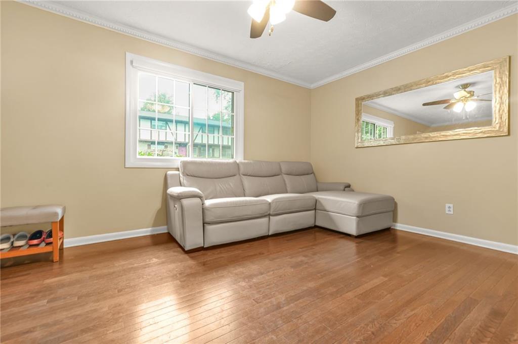 2952 North Dekalb Drive, Unit C Atlanta, GA 30340 - Photo 6 of 27 a living room with furniture and a window