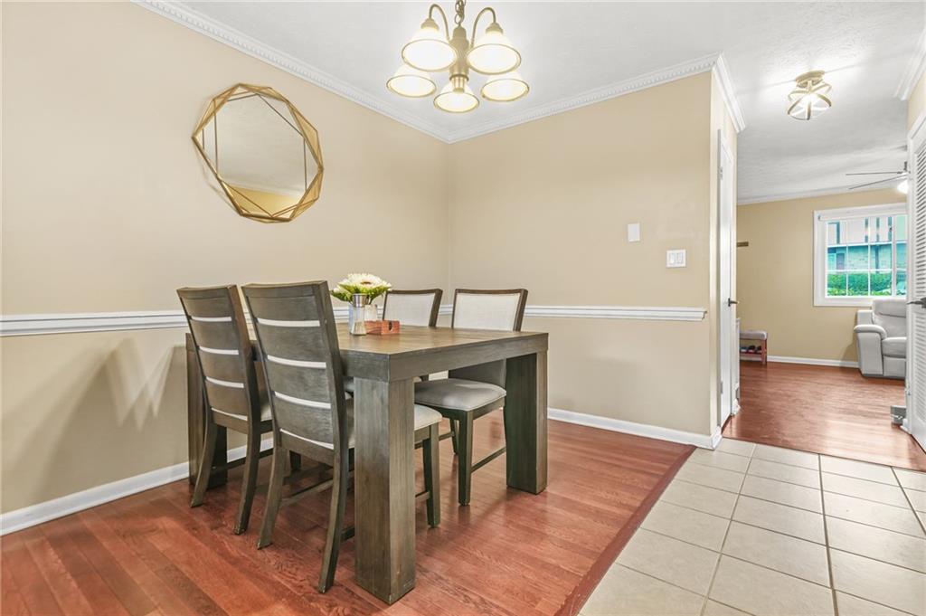 2952 North Dekalb Drive, Unit C Atlanta, GA 30340 - Photo 8 of 27 a view of a dining room with furniture and wooden floor
