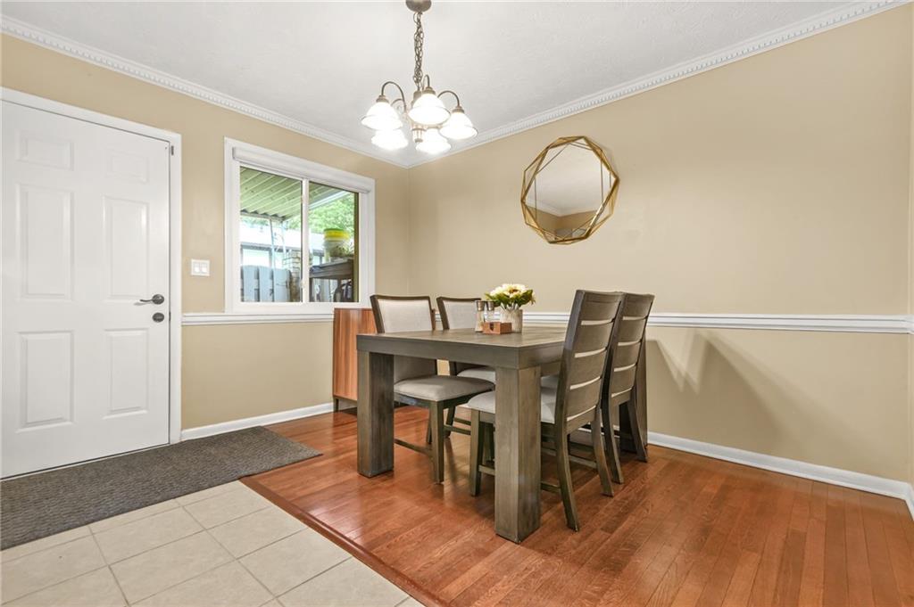 2952 North Dekalb Drive, Unit C Atlanta, GA 30340 - Photo 9 of 27 a view of a dining room with furniture and chandelier
