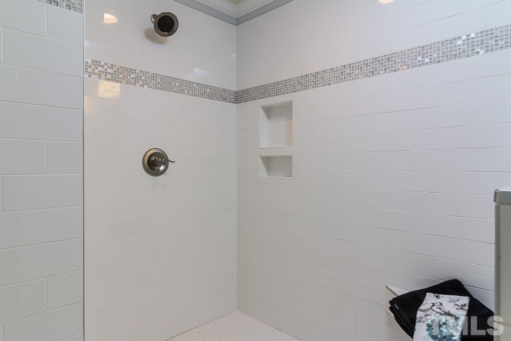 3411 Leonard Street Raleigh, NC 27607 - Photo 13 of 25 a bathroom with a shower and a shower