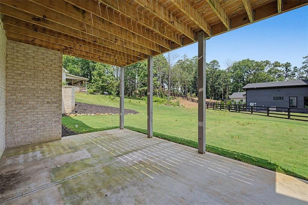 217 Laura Lake Road Marietta, GA 30066 - Photo 51 of 54 a view of a backyard with a garden
