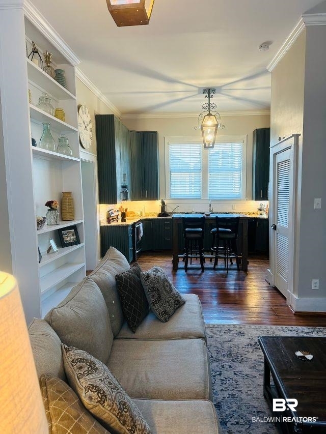 54 South Catherine Street Mobile, AL 36604 - Photo 22 of 55 View of kitchen from living area showing kitchen features, including pantry, open shelving, handsome hardwood floors, and more