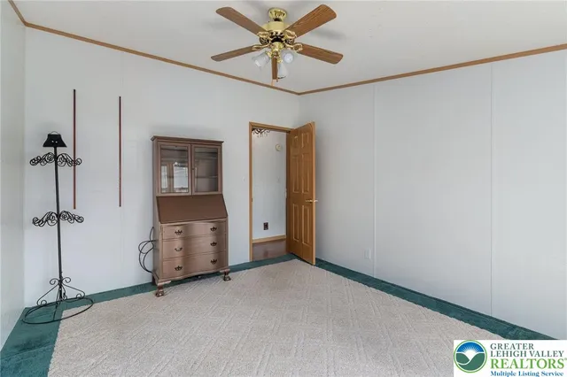 a view of empty room with windows