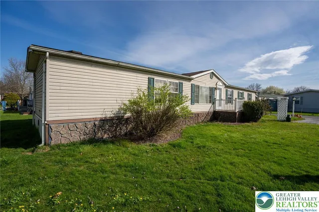 a house view with a garden space