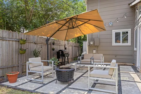 a house view with a garden space