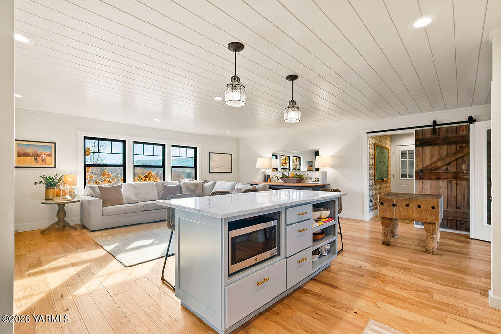 367 Baker Road Selah, WA 98942 - Photo 11 of 55 a kitchen with stainless steel appliances granite countertop a stove and a refrigerator