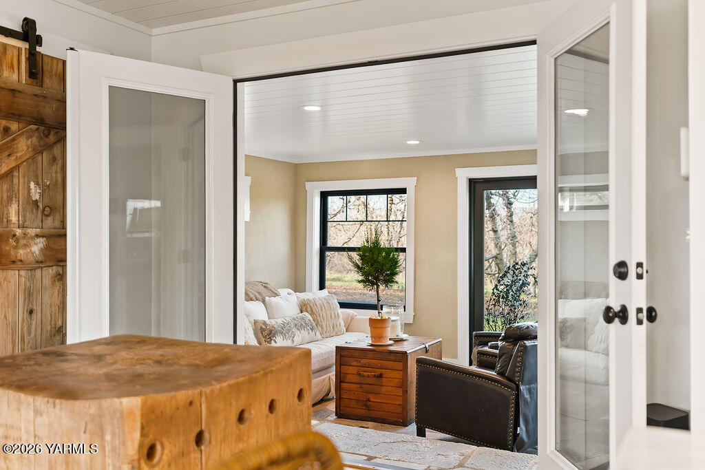 367 Baker Road Selah, WA 98942 - Photo 16 of 55 a bed room with a bed and glass window