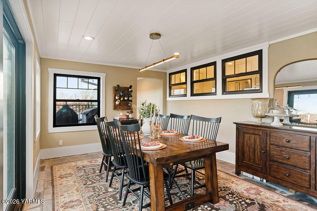 367 Baker Road Selah, WA 98942 - Photo 20 of 55 a view of a dining room with furniture window and wooden floor