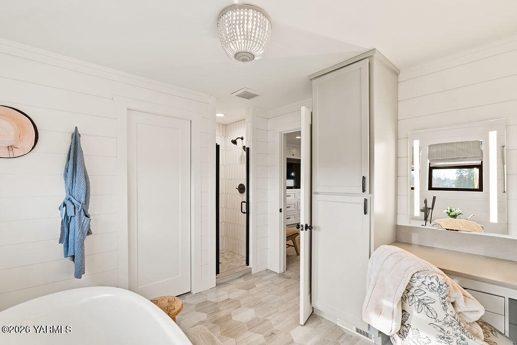 367 Baker Road Selah, WA 98942 - Photo 25 of 55 a spacious bedroom with a bed and a dresser in it