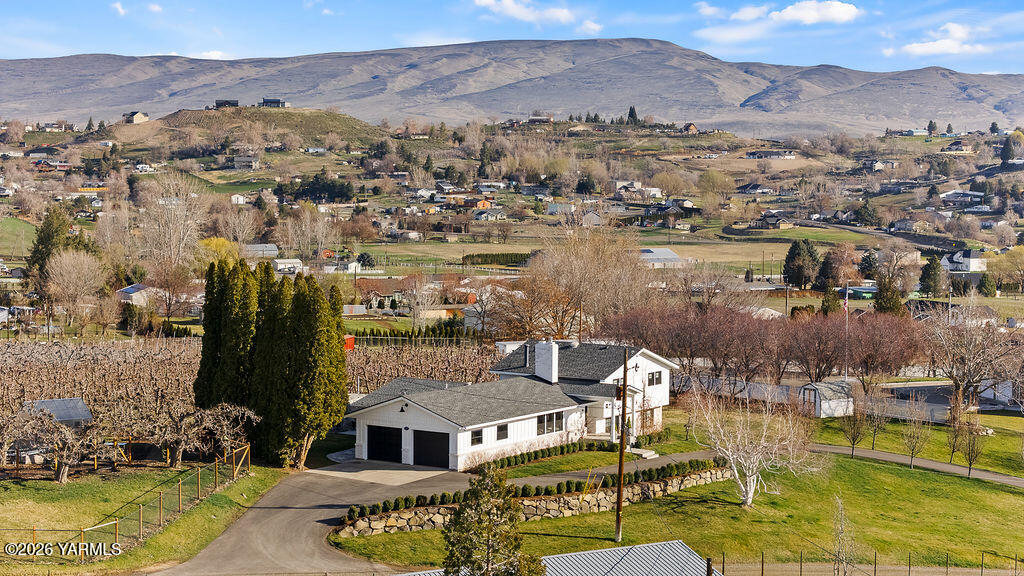 367 Baker Road Selah, WA 98942 - Photo 54 of 55 a view of a lake with a mountain in the background