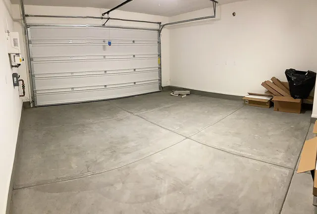 a kitchen with stainless steel appliances kitchen island wooden cabinets and granite counter tops