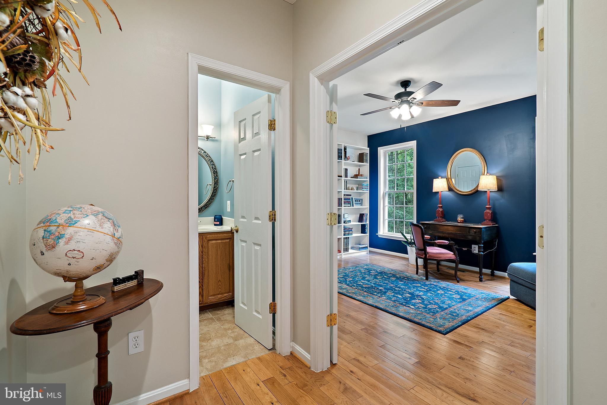 10086 Bear Ridge Rixeyville, VA 22737 - Photo 13 of 61 Hallway leads to powder room and study