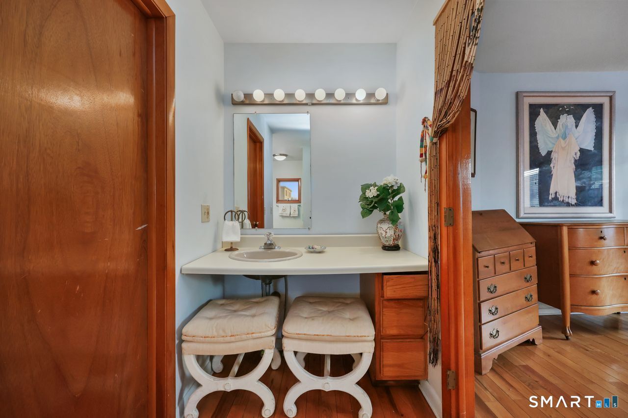 6 Lighthouse Point Fairfield, CT 06824 - Photo 30 of 40 a view of a dining room with furniture and wooden floor
