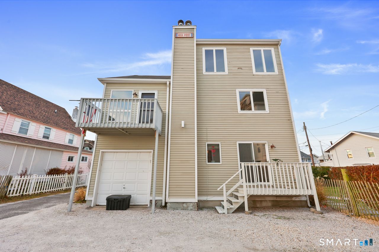 6 Lighthouse Point Fairfield, CT 06824 - Photo 5 of 40 a house view with a outdoor space