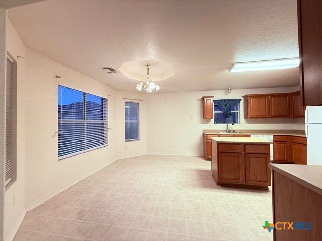 2104 Prestige Loop Killeen, TX 76549 - Photo 11 of 29 a view of kitchen with a sink and a stove top oven
