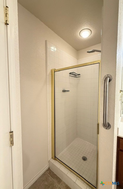 2104 Prestige Loop Killeen, TX 76549 - Photo 16 of 29 a bathroom with a glass shower door