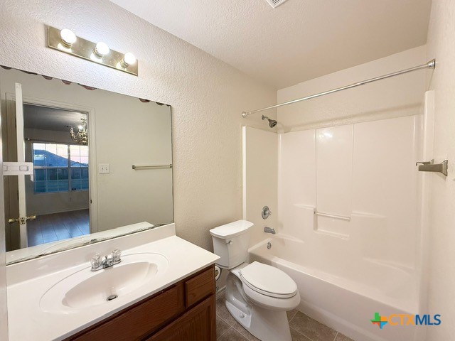 2104 Prestige Loop Killeen, TX 76549 - Photo 24 of 29 a bathroom with a sink a toilet a mirror and shower
