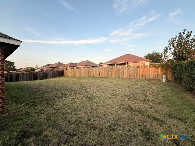 2104 Prestige Loop Killeen, TX 76549 - Photo 27 of 29 a view of a big house with a big yard and large tree
