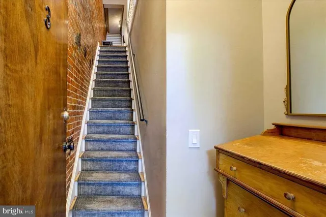 a view of a room with stairs
