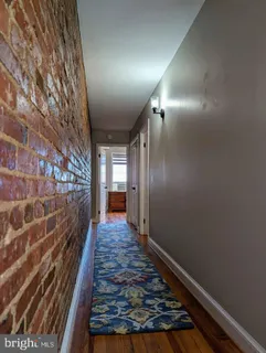 a view of hallway with stairs