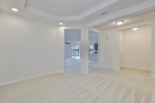 a large kitchen with granite countertop lots of counter top space