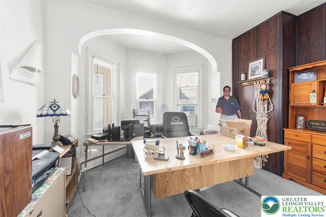 a view of a dining room with furniture