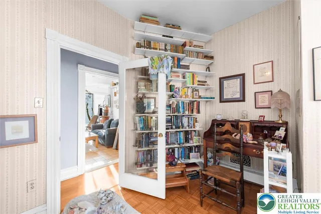 a living room with furniture and a window