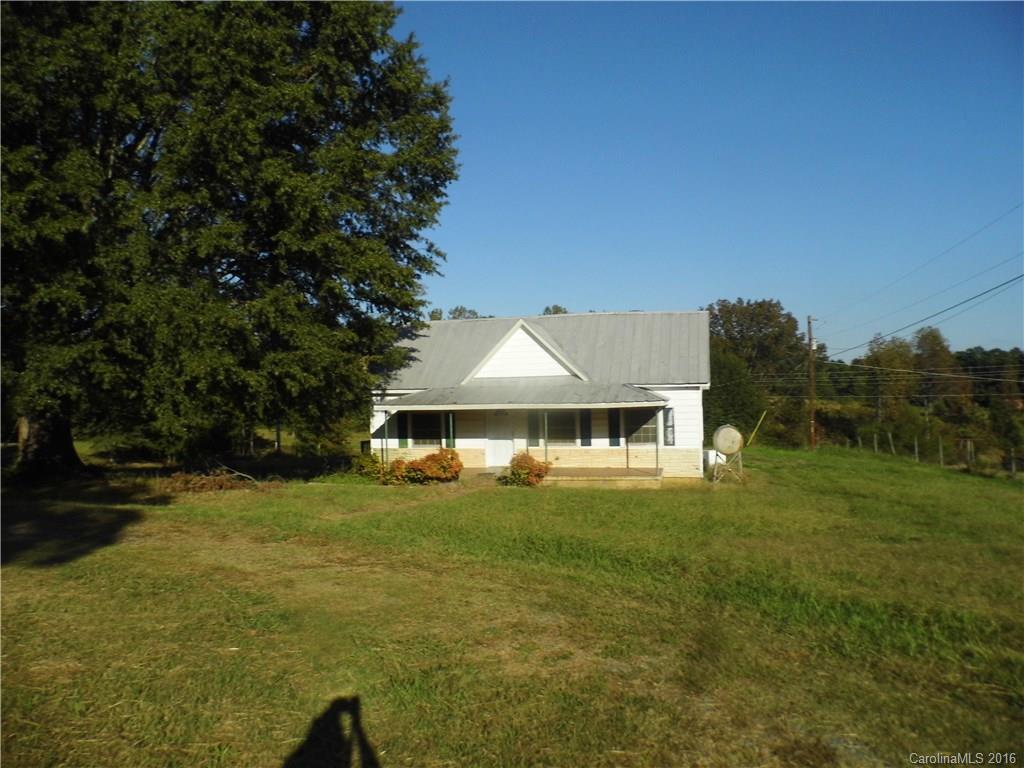8376 Smith Road Stanfield, NC 28163 - Photo 1 of 15 a view of a house with a yard