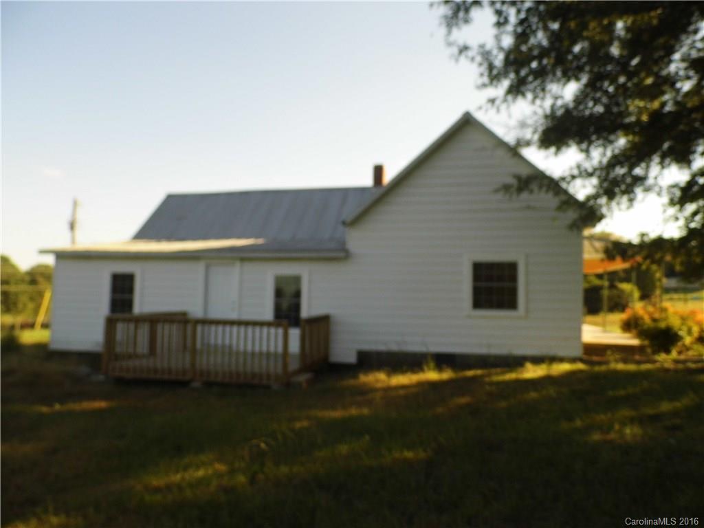 8376 Smith Road Stanfield, NC 28163 - Photo 2 of 15 a view of backyard of house