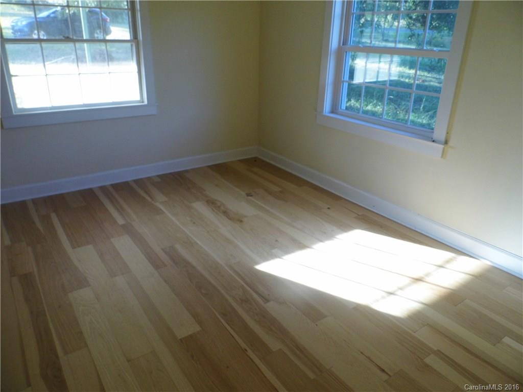 8376 Smith Road Stanfield, NC 28163 - Photo 12 of 15 a view of an empty room and window
