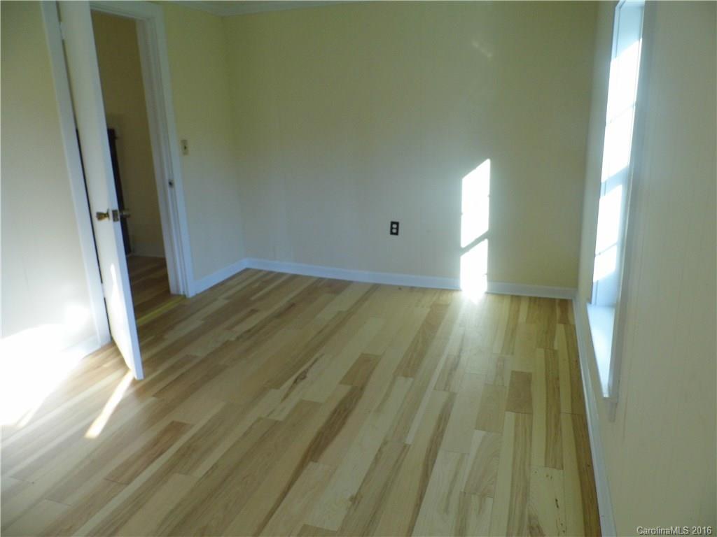 8376 Smith Road Stanfield, NC 28163 - Photo 13 of 15 a view of wooden floor
