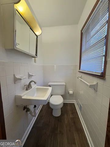 a bathroom with a sink and a toilet