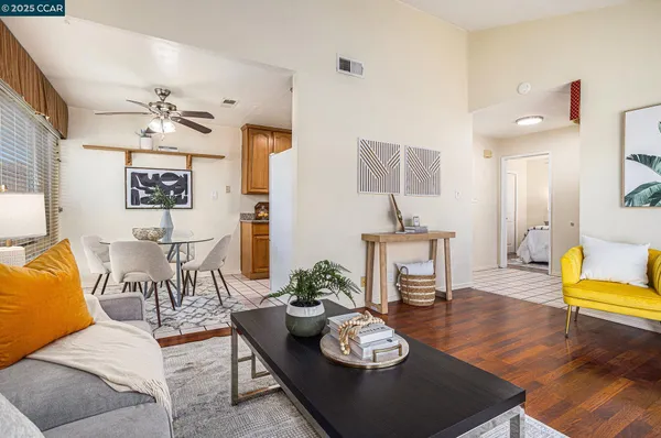 a living room with furniture and a table
