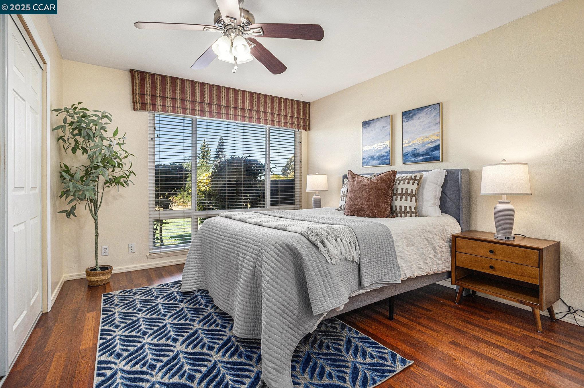 1395 Kenwal Road, Unit A Concord, CA 94521 - Photo 6 of 14 a bedroom with a bed and a window