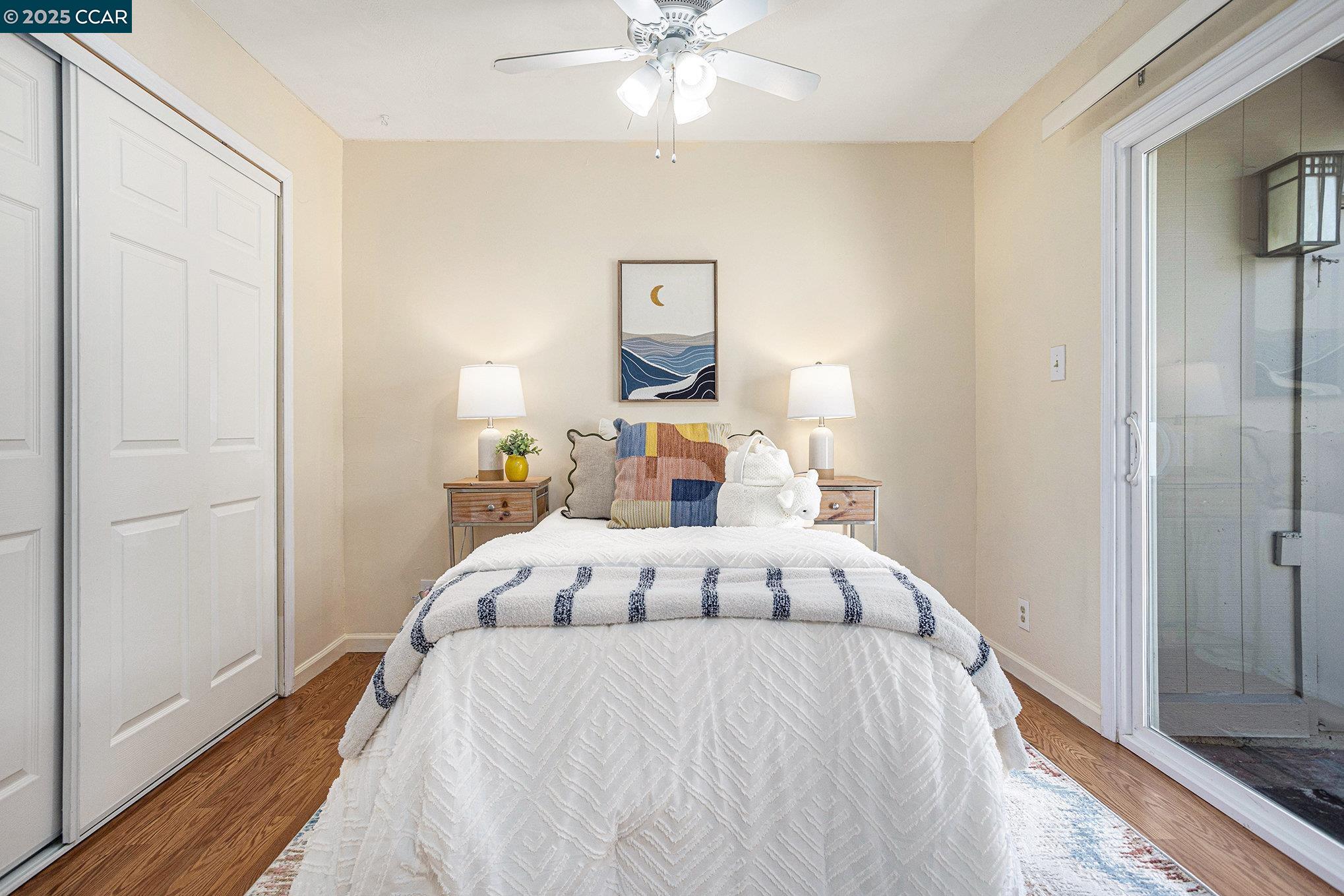 1395 Kenwal Road, Unit A Concord, CA 94521 - Photo 7 of 14 a bedroom with a bed and a window