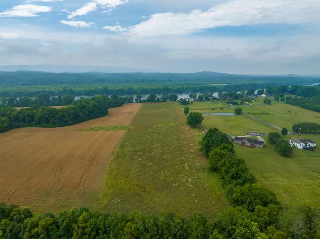 a view of a lake with a yard