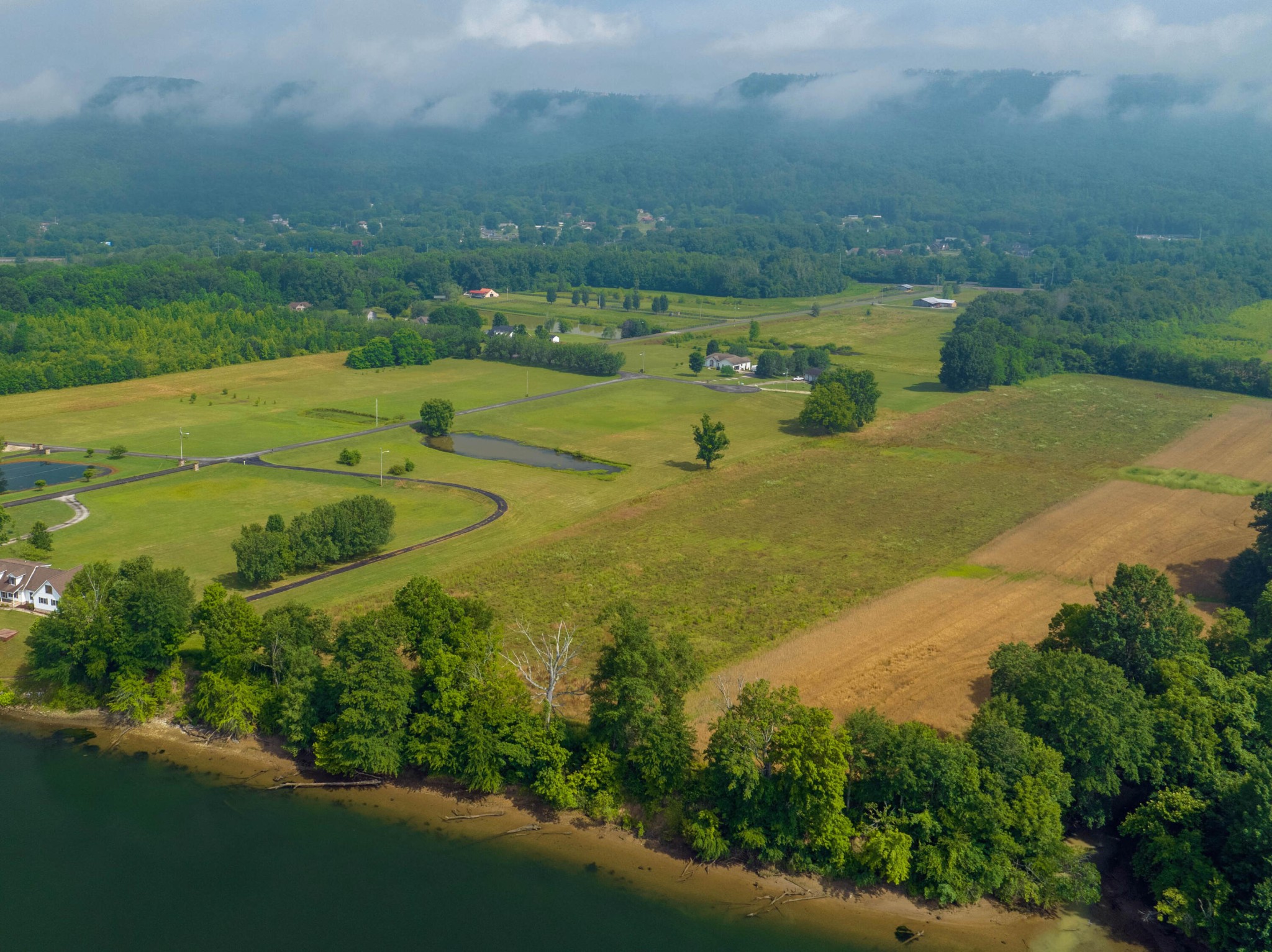 0 Water Front Place Jasper, TN 37347 - Photo 16 of 18 a view of a yard with an outdoor space