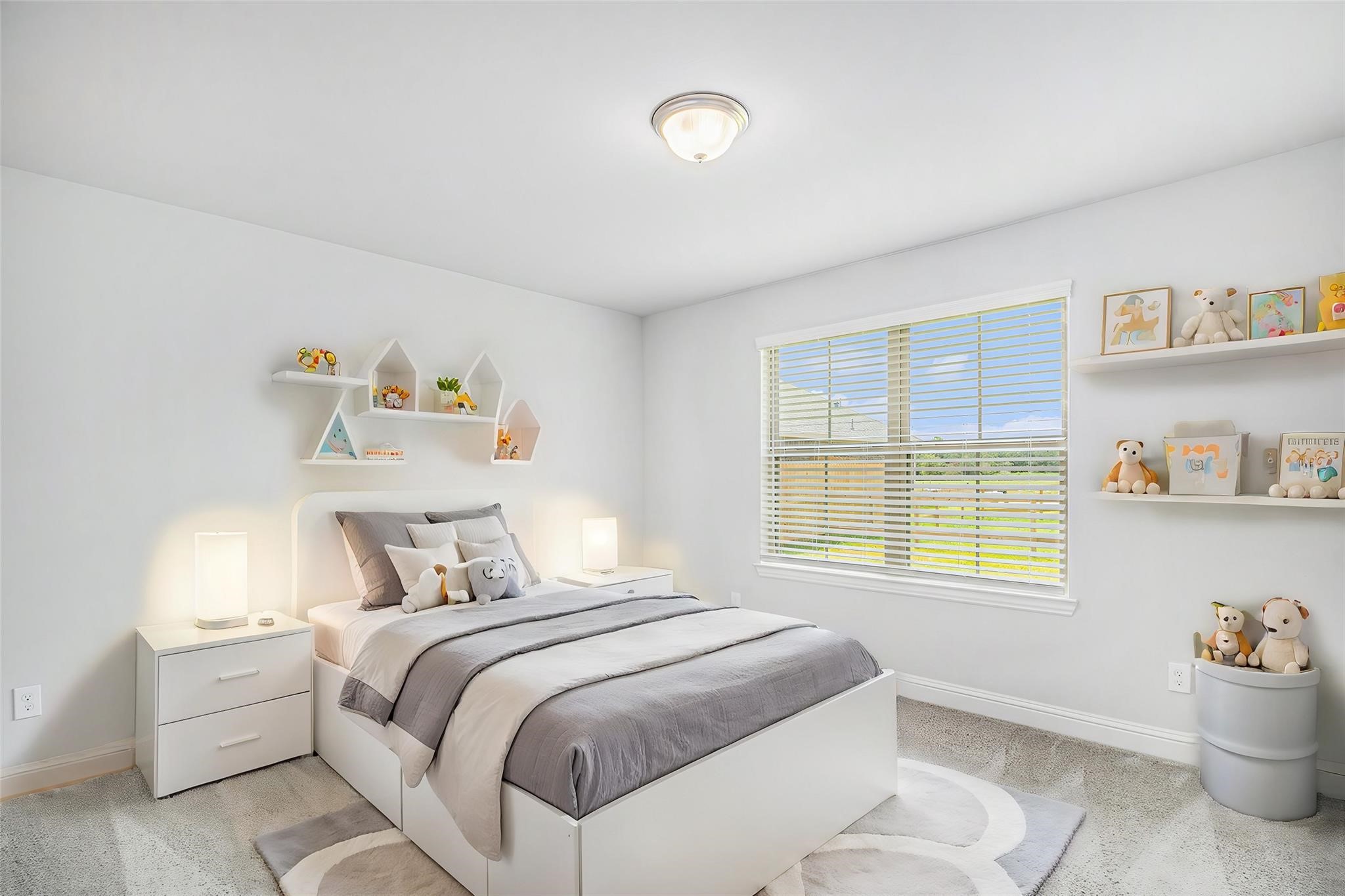 10 Greystone Court Angleton, TX 77515 - Photo 8 of 10 a bedroom with a bed and a window