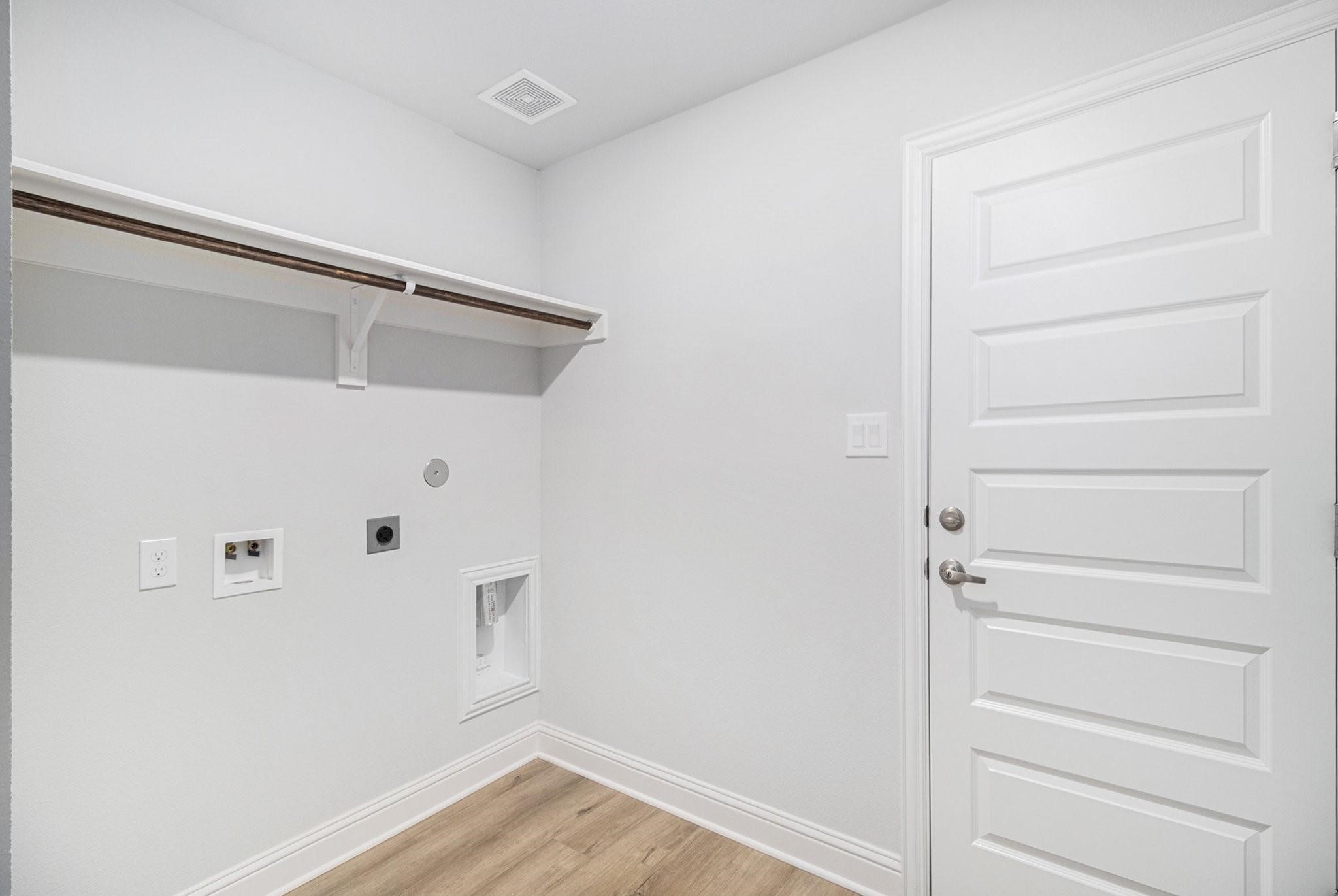 10 Greystone Court Angleton, TX 77515 - Photo 10 of 10 a view of walk in closet with empty racks