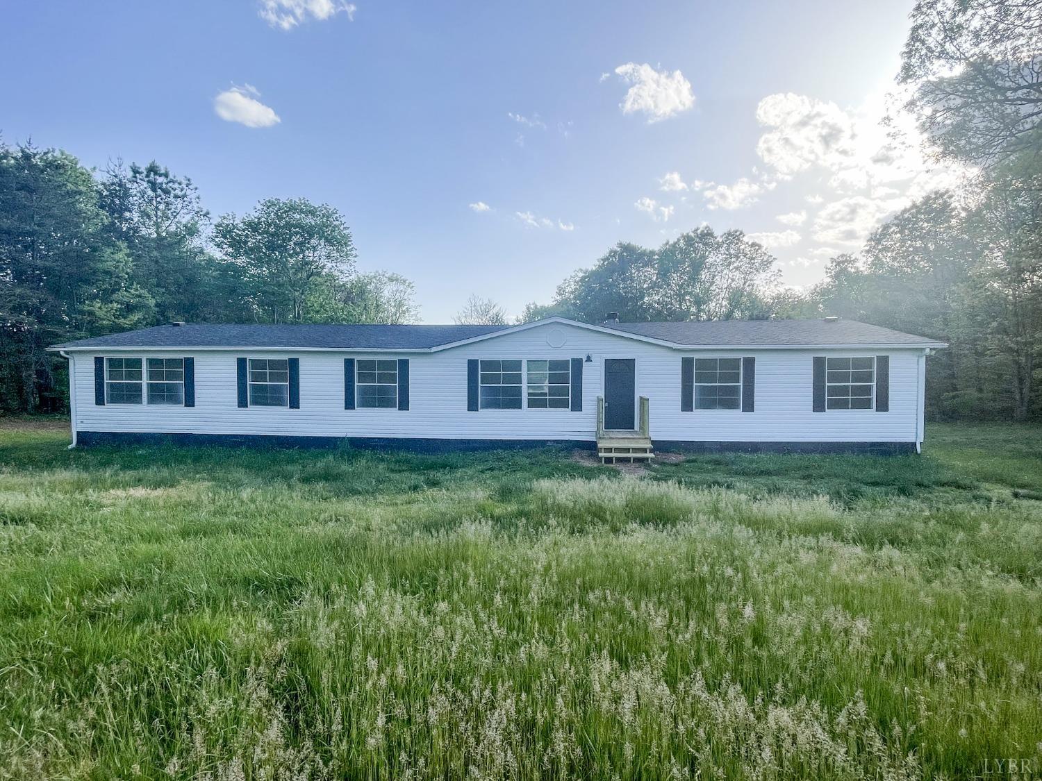 1507 Paradise Road Spout Spring, VA 24538 - Photo 1 of 21 a view of a house with backyard