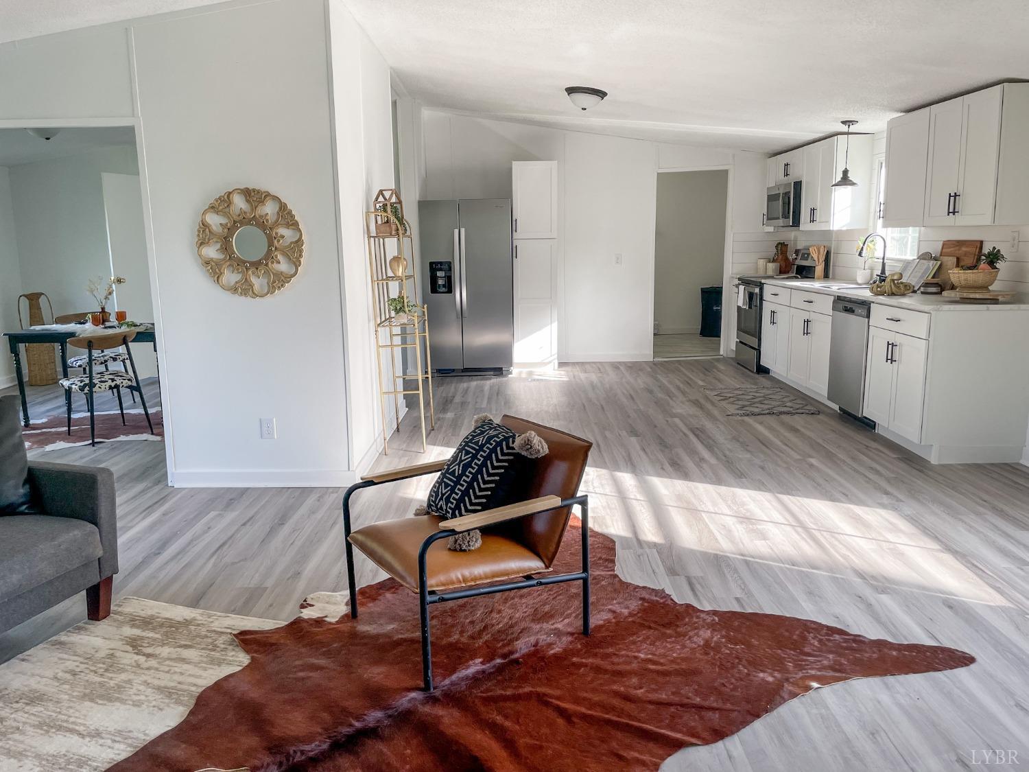 1507 Paradise Road Spout Spring, VA 24538 - Photo 6 of 21 a living room with furniture and a wooden floor