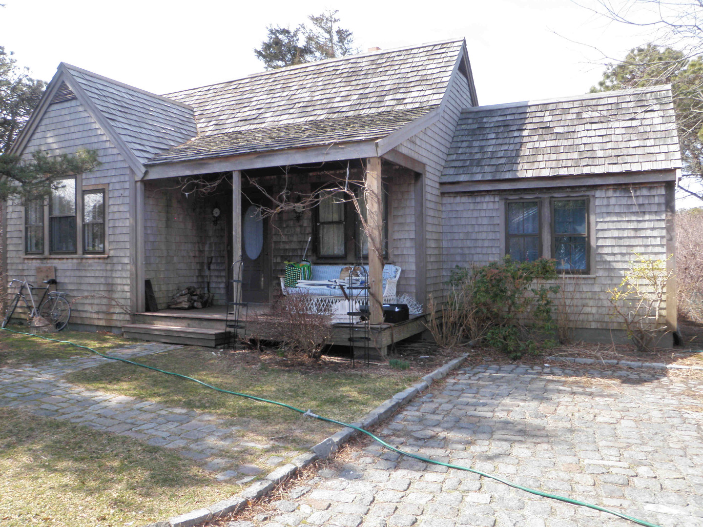 24 Miacomet Road Nantucket, MA 02554 - Photo 3 of 3 a front view of a house with yard