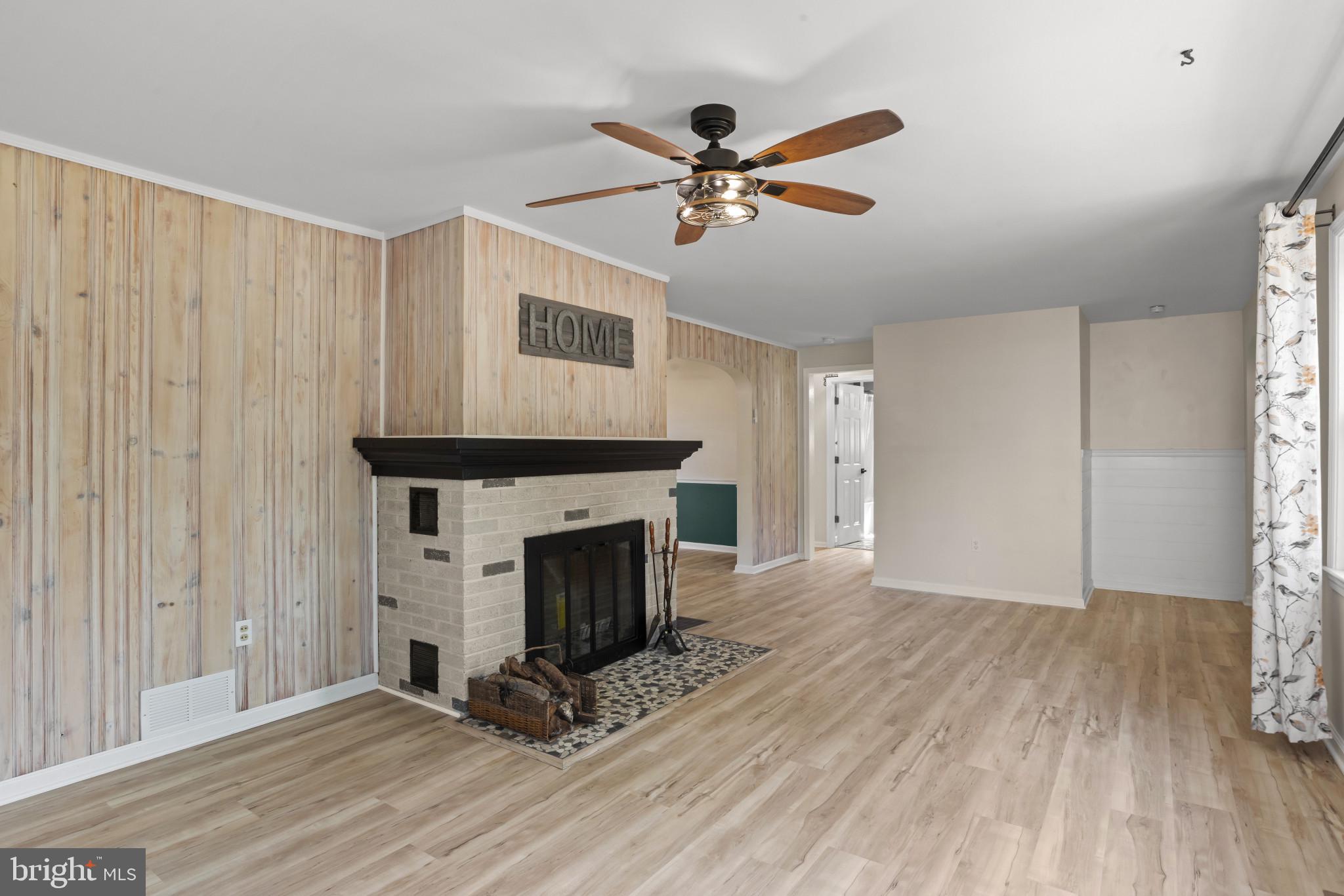 14 Sharon Road Enola, PA 17025 - Photo 6 of 40 Living area featuring a floor-to-ceiling wood plan