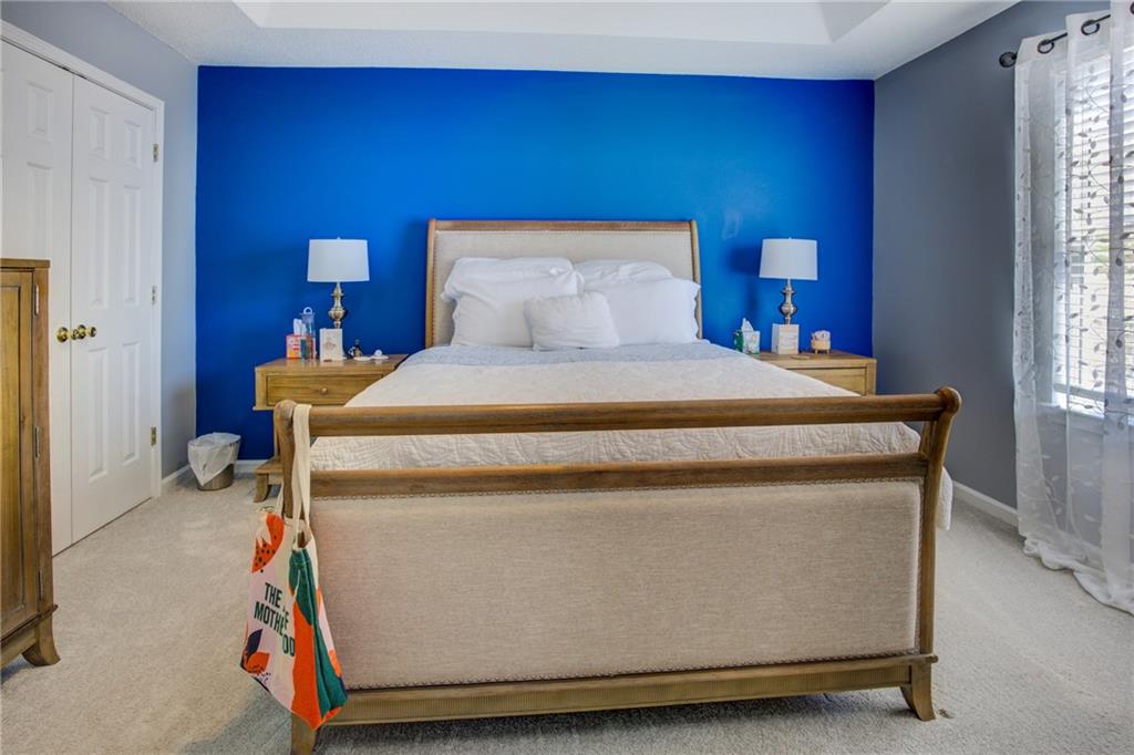 4885 Hidden Creek Place Decatur, GA 30035 - Photo 26 of 52 a room with a bed and a window