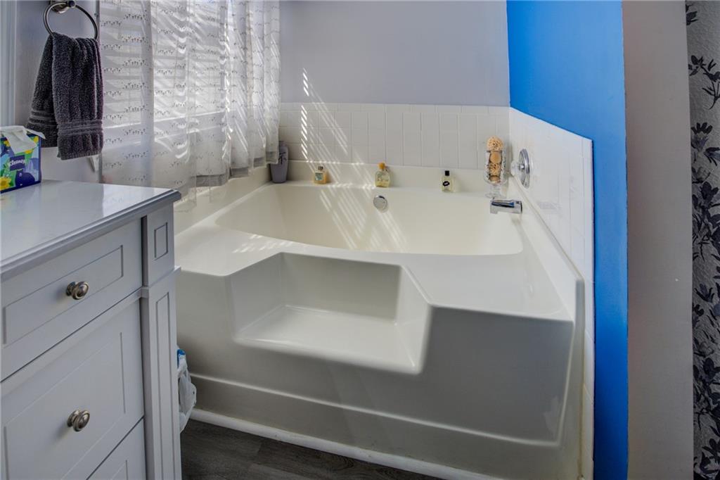 4885 Hidden Creek Place Decatur, GA 30035 - Photo 29 of 52 a bathroom with a sink and a mirror