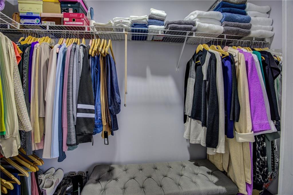 4885 Hidden Creek Place Decatur, GA 30035 - Photo 30 of 52 a view of walk in closet with clothes and shoes